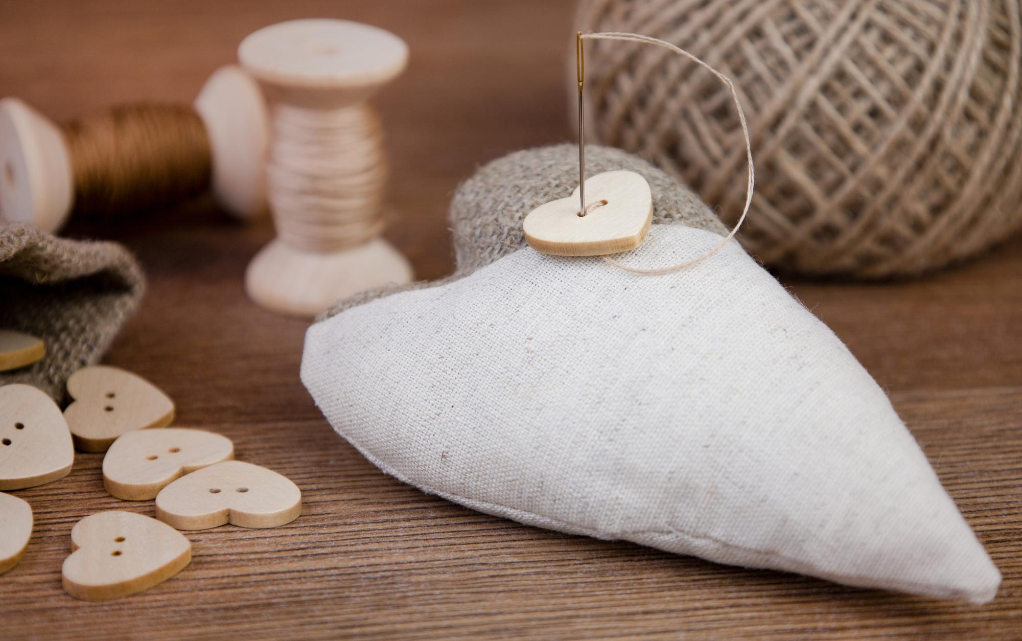 Embroidered linen cushion with tonal pattern