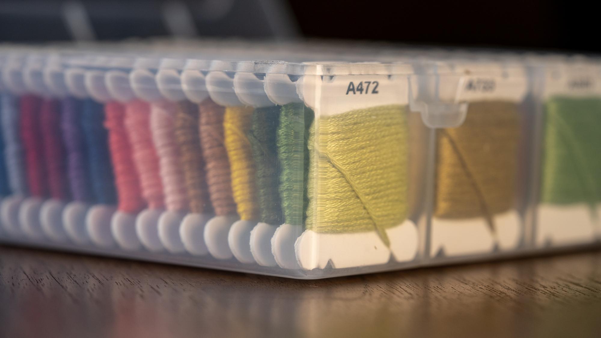 Sample swatches and price sheet on desk